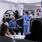 hospital lobby with waiting patients