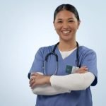 Nurse smiling and crossing arms