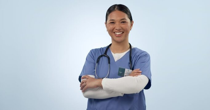 Nurse smiling and crossing arms